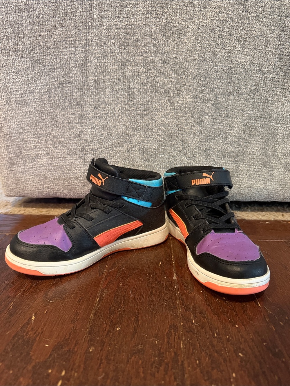 Puma Kids Mid-Top Sneakers in Black with Purple and Coral and Blue Accents